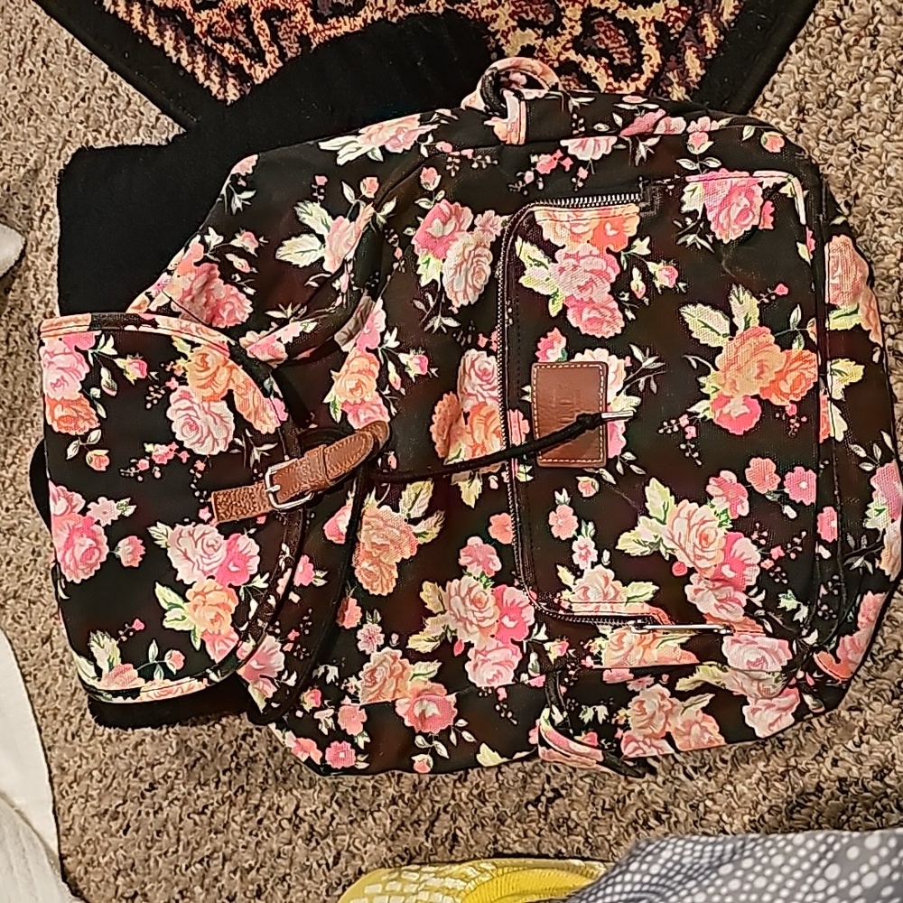 Victoria's secret pink....FLORAL CANVAS backpack..retired...very good